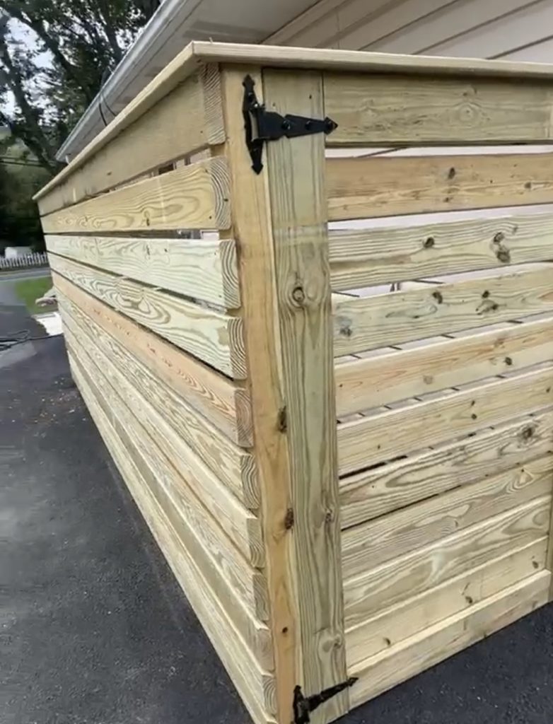 Custom wood fence installation at a Connecticut home