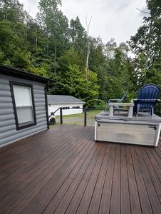 Before and after deck painting Connecticut project showing a professionally refreshed outdoor deck