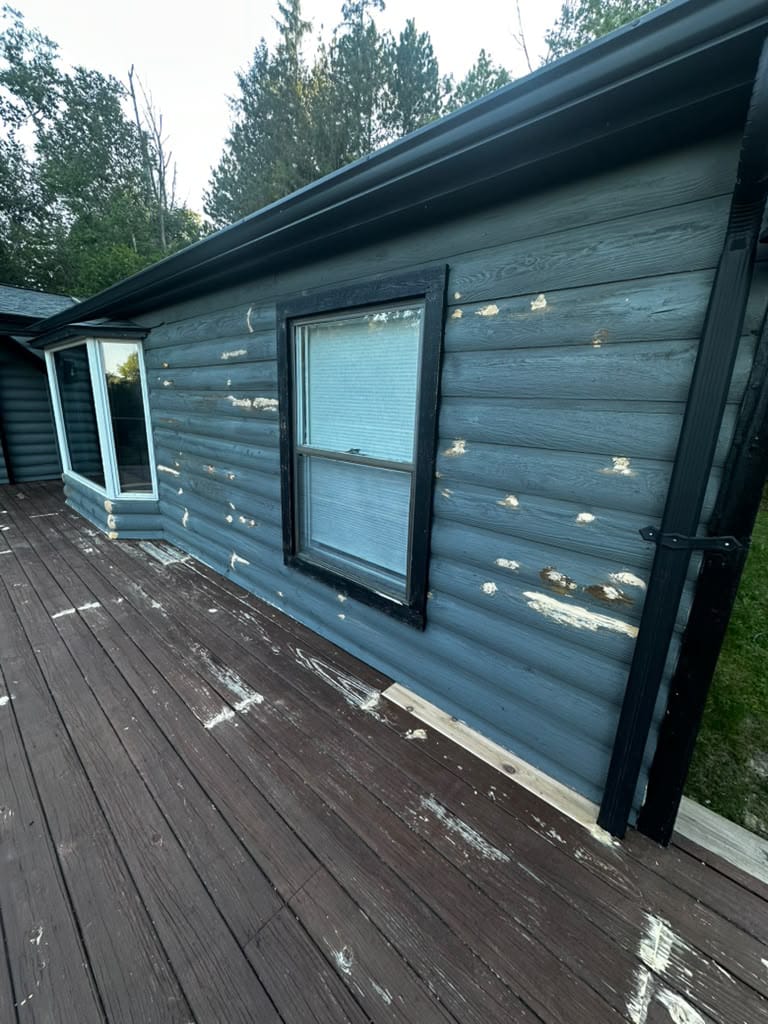 Before deck painting Connecticut project showing a worn outdoor deck
